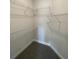 Walk-in closet with wire shelving and ample storage at 36188 Welsh Glade Rd, Dade City, FL 33525