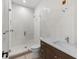Modern bathroom featuring a walk-in shower with glass door and a contemporary vanity at 2106 S Cortez Ave, Tampa, FL 33629