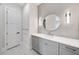Elegant powder room with stylish wall sconces, modern fixtures, and a sleek vanity at 2106 S Cortez Ave, Tampa, FL 33629
