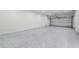 Clean and spacious garage with epoxy floors and an insulated garage door, ready for vehicle storage at 2106 S Cortez Ave, Tampa, FL 33629