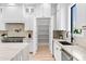 Well-appointed kitchen features custom cabinets, stainless steel appliances, and a walk-in pantry at 2106 S Cortez Ave, Tampa, FL 33629