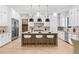 Stunning modern kitchen featuring a large island with seating and stainless steel appliances at 2106 S Cortez Ave, Tampa, FL 33629