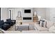 Cozy living room featuring a modern fireplace, stylish decor, and comfortable seating with neutral tones at 2106 S Cortez Ave, Tampa, FL 33629