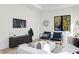 Inviting living room with modern accents, ample seating, and large windows with scenic views at 2106 S Cortez Ave, Tampa, FL 33629
