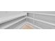 Bright walk-in pantry offers plenty of storage space with custom shelving at 2106 S Cortez Ave, Tampa, FL 33629