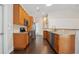 Kitchen with granite countertops and stainless steel appliances at 3554 Deer Run S, Palm Harbor, FL 34684