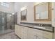 Bathroom with double vanity, granite countertop, and large shower at 3554 Deer Run S, Palm Harbor, FL 34684