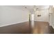 Bright bedroom with hardwood floors and access to another room at 3554 Deer Run S, Palm Harbor, FL 34684