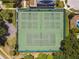 Aerial view of community tennis and pickleball courts at 3554 Deer Run S, Palm Harbor, FL 34684