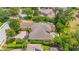 Sprawling home with an attached three-car garage, manicured landscaping, and a private pool at 1227 Toscano Dr, Trinity, FL 34655