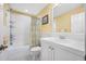 An inviting bathroom with a tub and shower combo and a white vanity at 1227 Toscano Dr, Trinity, FL 34655
