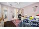 A bedroom with a ceiling fan, a desk, and access to the bathroom at 1227 Toscano Dr, Trinity, FL 34655