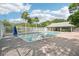 Another view of the sparkling community pool with plenty of room to unwind at 5723 Autumn Shire Dr, Zephyrhills, FL 33541