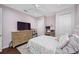 Charming bedroom with a queen-size bed, built in desk, and ample closet space at 1227 Toscano Dr, Trinity, FL 34655