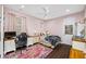 Bedroom with twin bed, workspace, and colorful rug at 1227 Toscano Dr, Trinity, FL 34655