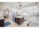 Modern kitchen with a large island, stainless steel appliances, and ample storage at 1227 Toscano Dr, Trinity, FL 34655