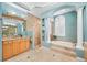Spa-like bathroom with soaking tub, double vanity, and separate shower at 1227 Toscano Dr, Trinity, FL 34655
