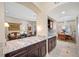 Kitchen features granite countertops and custom cabinetry at 1227 Toscano Dr, Trinity, FL 34655