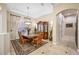 Formal dining room with a large table and decorative cabinetry at 1227 Toscano Dr, Trinity, FL 34655