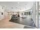 Fitness center with various exercise equipment and large windows at 5723 Autumn Shire Dr, Zephyrhills, FL 33541