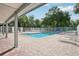 Community pool with plenty of lounge chairs at 5723 Autumn Shire Dr, Zephyrhills, FL 33541