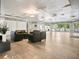 Bright community room with tiled floors and seating area at 5723 Autumn Shire Dr, Zephyrhills, FL 33541