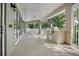 Outdoor grilling area with seating under covered patio at 5723 Autumn Shire Dr, Zephyrhills, FL 33541