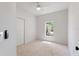 Bright bedroom with carpet flooring and a view of the backyard at 13231 Snowy Plover Ave, Weeki Wachee, FL 34614