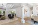 Open living and dining area with high ceilings at 13231 Snowy Plover Ave, Weeki Wachee, FL 34614
