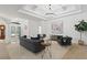 Elegant living room boasts a plush sofa and decorative accents at 13231 Snowy Plover Ave, Weeki Wachee, FL 34614