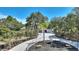 House with curved walkway and fountain in front at 13231 Snowy Plover Ave, Weeki Wachee, FL 34614