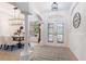 Elegant dining room with chandelier and hardwood floors at 13231 Snowy Plover Ave, Weeki Wachee, FL 34614