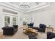 Bright living room features comfortable seating and natural light at 13231 Snowy Plover Ave, Weeki Wachee, FL 34614