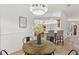 Casual breakfast nook with wood table and kitchen views at 13231 Snowy Plover Ave, Weeki Wachee, FL 34614