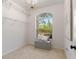 Large walk-in closet with window and ample shelving at 13231 Snowy Plover Ave, Weeki Wachee, FL 34614