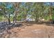 House nestled in a wooded backyard with ample space at 13231 Snowy Plover Ave, Weeki Wachee, FL 34614