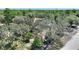 Aerial view of property and surrounding land at 13231 Snowy Plover Ave, Weeki Wachee, FL 34614