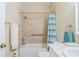 Bathroom with shower/tub combo and updated tile surround at 2346 Nantucket Dr # 58, Sun City Center, FL 33573