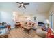 Open living room with hardwood floors and access to the kitchen at 2346 Nantucket Dr # 58, Sun City Center, FL 33573