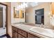 Bathroom with double sinks and a large mirror at 6605 Pemberton Sage Ct, Seffner, FL 33584