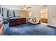Comfortable bedroom offering good natural light and a seating area at 6605 Pemberton Sage Ct, Seffner, FL 33584