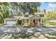 Charming two-story home with an attached two-car garage and beautifully landscaped front yard at 6605 Pemberton Sage Ct, Seffner, FL 33584