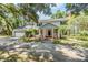 Charming two-story home with a well-manicured lawn, attached two-car garage, and inviting front porch at 6605 Pemberton Sage Ct, Seffner, FL 33584