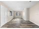 Living room with wood-look floors and large windows at 2504 38Th W Ave, Bradenton, FL 34205