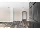 Bright and airy living room featuring new wood-look flooring and built-in shelving at 2504 38Th W Ave, Bradenton, FL 34205