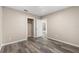Simple bedroom with wood-look floors and a closet at 2504 38Th W Ave, Bradenton, FL 34205