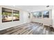 Living room with backyard views and wood-look floors at 2504 38Th W Ave, Bradenton, FL 34205