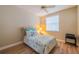 Charming bedroom with a full-size bed and a window with blinds at 2346 Nantucket Dr # 58, Sun City Center, FL 33573