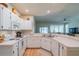 Cozy kitchen with white cabinetry and appliances at 2346 Nantucket Dr # 58, Sun City Center, FL 33573