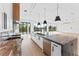 Kitchen featuring a large island, stainless steel appliances, and a view of the water at 5006 W San Miguel St, Tampa, FL 33629